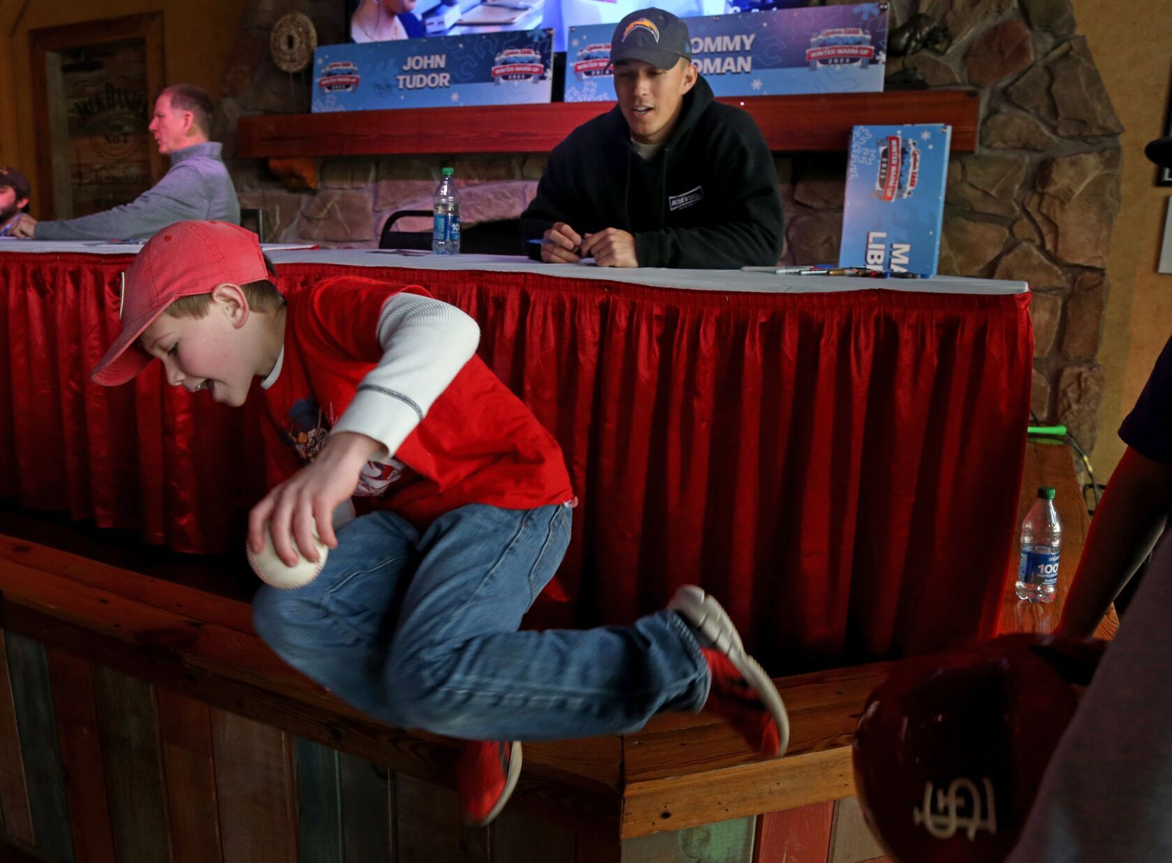 St. Louis Cardinals second baseman Tommy Edman signs autographs